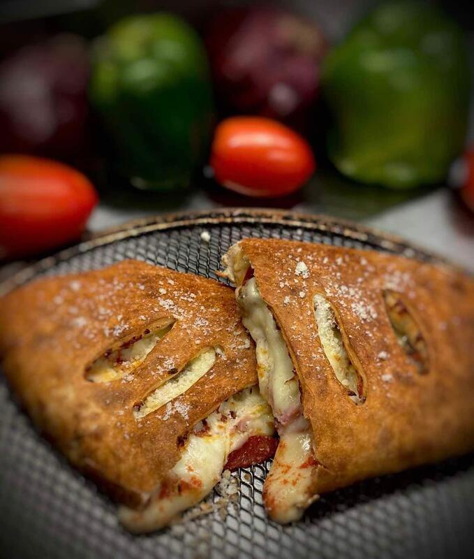 Two Calzone & Two 20 oz. Drinks